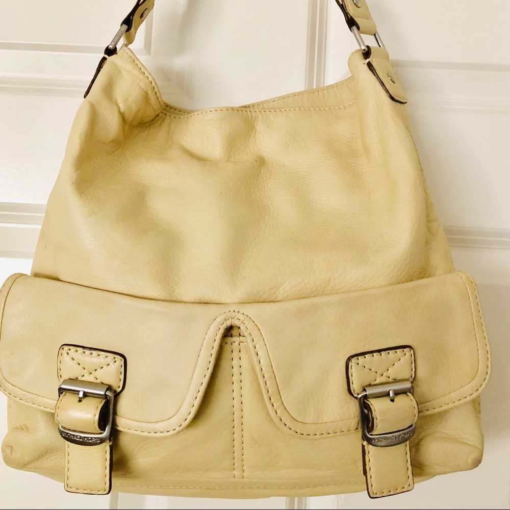 Gently used pale yellow MK shoulder bag.